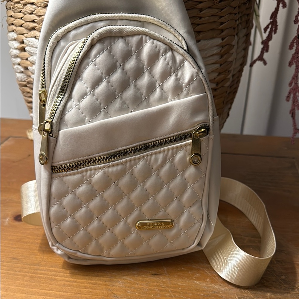 Cream Quilted crossbody Backpack with Diamond Pattern and Gold Accents - Picture 2 of 7